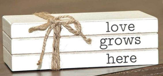 Love Grows Here Stacked Books